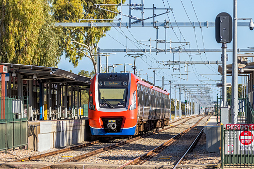 Adelaide, Australia - May 18, 2022: Adelaide Metro electric train on electrified 25kV Gawler Line stops at Parafield Station bound for Adelaide Railway Station in the city.