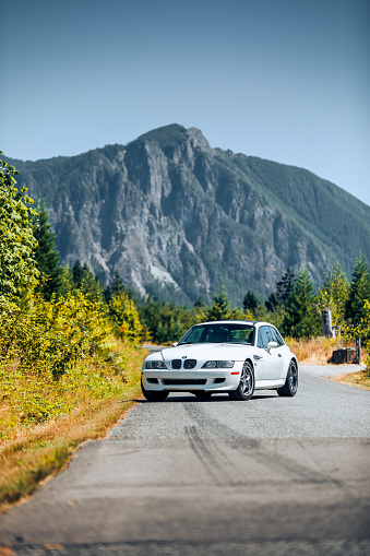 North Bend, WA, USA\n4/1/2022\nBMW Z3 M Coupe in white parked with Mt. Si in the background