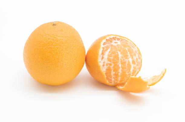istock whole and slice Tangerine or kamala over on white background. 1401741078