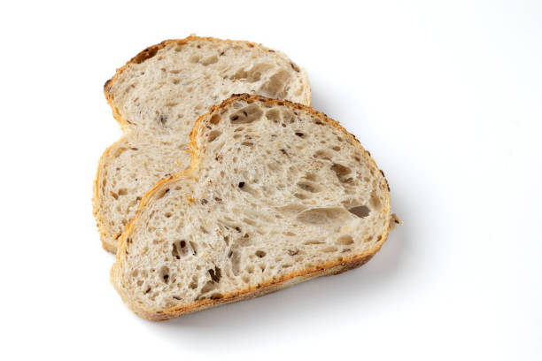 istock slices of bread isolated on white background, top view 1401741238