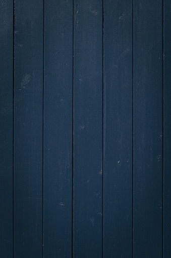 Section of a blue wooden wall.