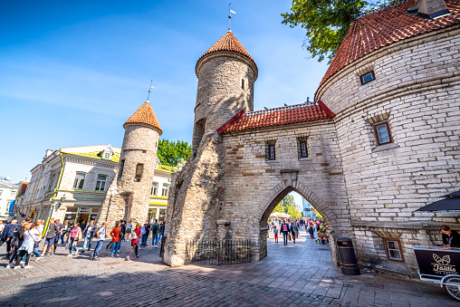 Tallinn, Estonia - August 5, 2019: Twin towers of Viru Gate in the old town of Tallinn, Estonia
