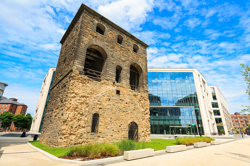 New office buildings in Leeds. These have been built around an old part of a Victorian railway station, which is an icon of the local area.