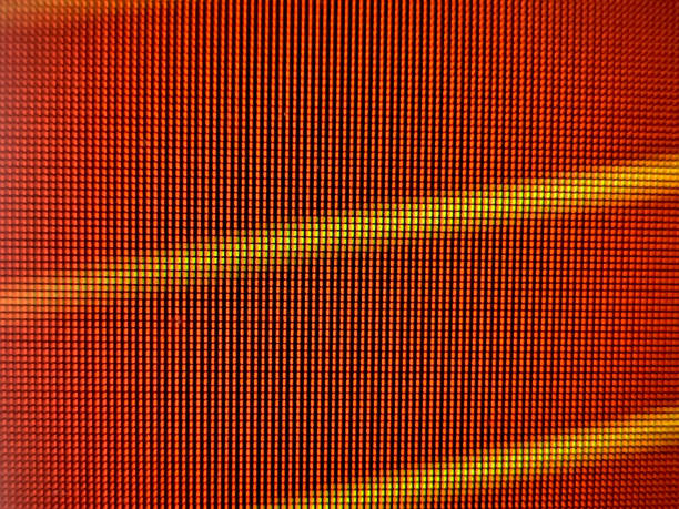 istock Red and yellow pixels of a screen. 1401746076