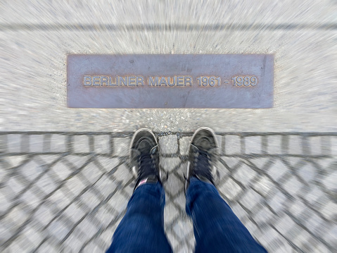 Commemorative plaque indicating where the former berlin border wall was located