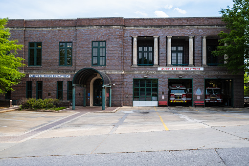 Asheville, North Carolina USA - May 5, 2022: Cityscape view of the police and fire departmentl building in this popular small town destination in the Blue Ridge mountains.
