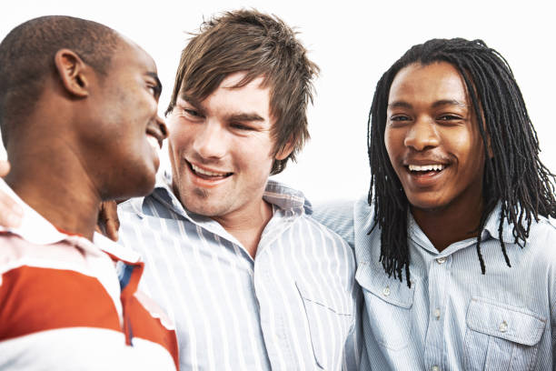 istock Three happy male friends chatting and bonding 1401747849