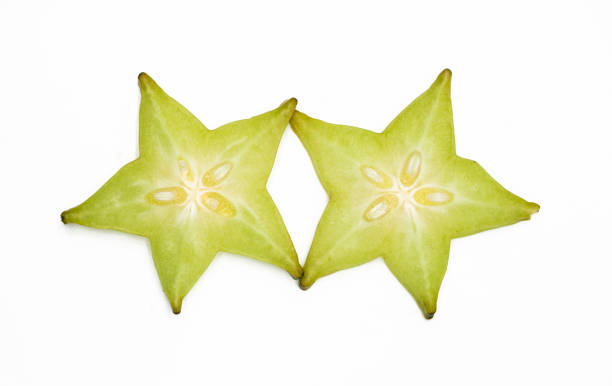 fresh Star fruit or carambola slices on white background top view stock photo