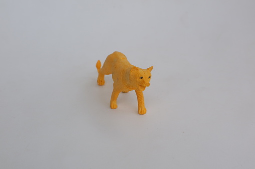 lioness shaped toy made of plastic photo