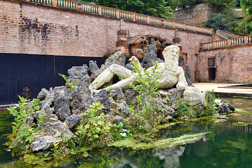 Heidelberg, Germany - June 2022: Neptune Fountain statue at Heidelberg castle park