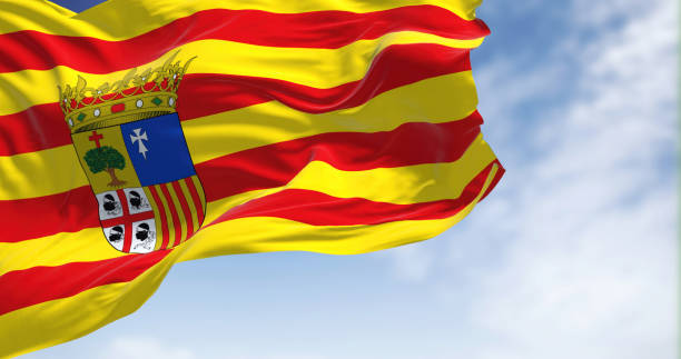 istock Aragonese flag waving in the wind on a clear day 1401752152