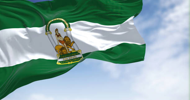 istock Andalusian flag waving in the wind on a clear day 1401752159