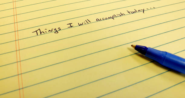 istock Things I will Accomplish Today Note on Notebook Paper Blue Pen Self Improvement 1401753368