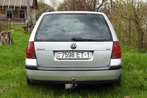 Belarus, Minsk - 05.03.2022: Volkswagen Golf IV wagon silver compact car parked on a country road.