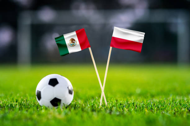 Mexico vs. Poland, Stadium 974,, Football match wallpaper, Handmade national flags and soccer ball on green grass. Football stadium in background. Black edit space. Mexico vs. Poland, Stadium 974,, Football match wallpaper, Handmade national flags and soccer ball on green grass. Football stadium in background. Black edit space. mexico poland stock pictures, royalty-free photos & images