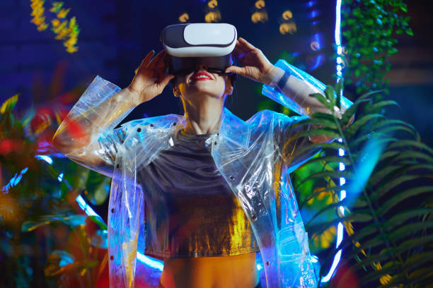 istock happy modern woman in metaverse in vr goggles 1401768872