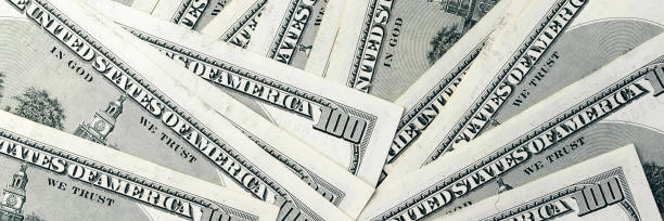 istock American paper dollar bills background banner 1401768965