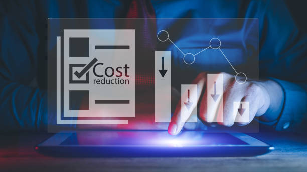 Cost reduction Concept. Cost reduction Concept. Businessman with his hand lowers the arrow of the graph. Cost text with a down arrow. budget,Cost Management lower technology stock pictures, royalty-free photos & images