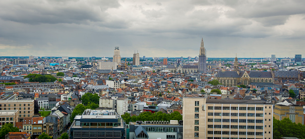 Antwerp, Belgium, June 2022: Panorama view on the skyline of Antwerp, Belgium with cathedral, Boerentoren, Oudaen tower, Sint-Paulus church and SD Worx building in frame.