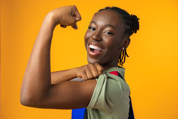istock Young african american handywoman in yellow studio 1401773601