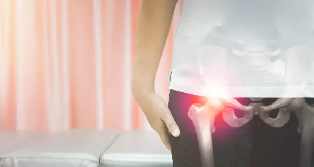 Photo of Close up older woman suffering from hip pain