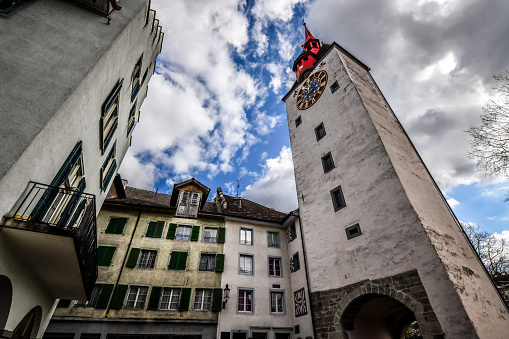 Eglisau, Switzerland - May 19, 2018: View of the old church, which is still in operation and the historic old town of the municipality Eglisau in the canton of Zurich in Switzerland.