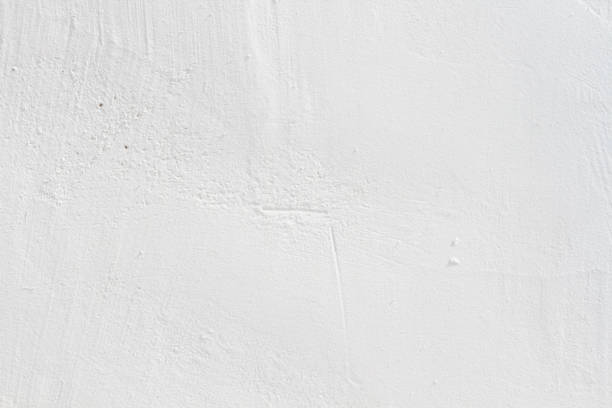 istock The texture of the stone wall.Small cracks on the concrete wall. 1401778388