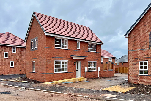 Wide angle view of new houses being built in the UK.