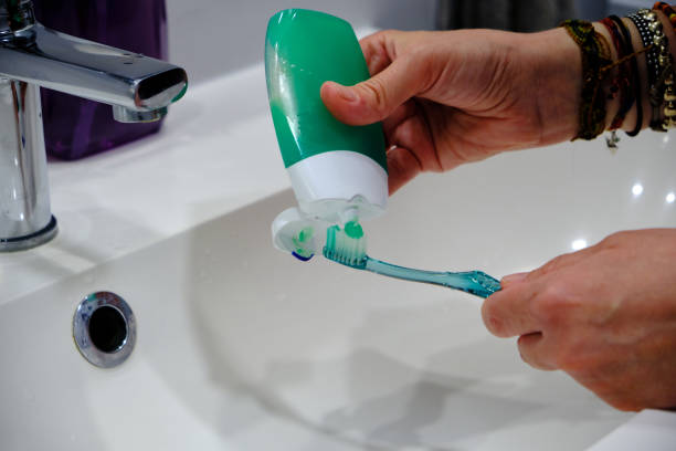 istock Toothbrush with green toothpaste tube 1401778968