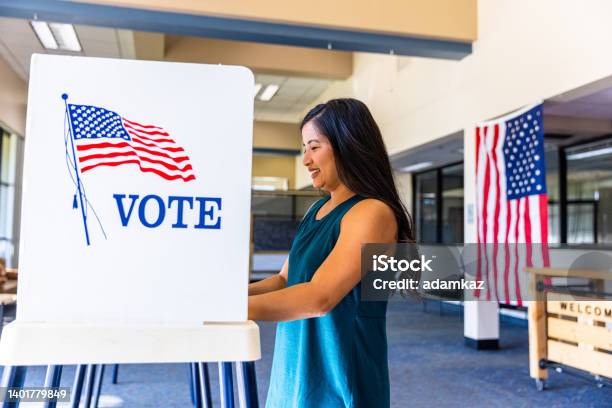 Americans Voting In An Election Stock Photo - Download Image Now - Voting, Asian and Indian Ethnicities, Voting Ballot