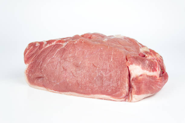 istock Raw beef with seasoning on white background. 1401781286