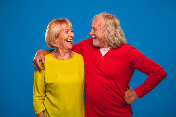 istock Relaxed Senior Couple Smiling and Looking at Each Other 1401784843