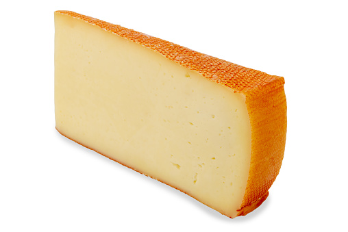 Parmesan cheese wheel on white background