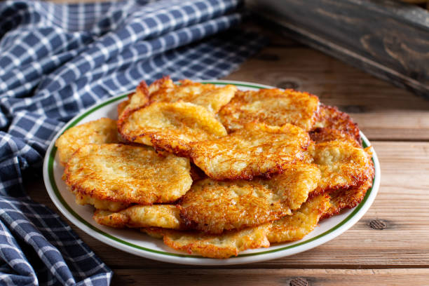istock Potato Cakes. Vegetable fritters, draniki. Vegetable pancakes 1401787727