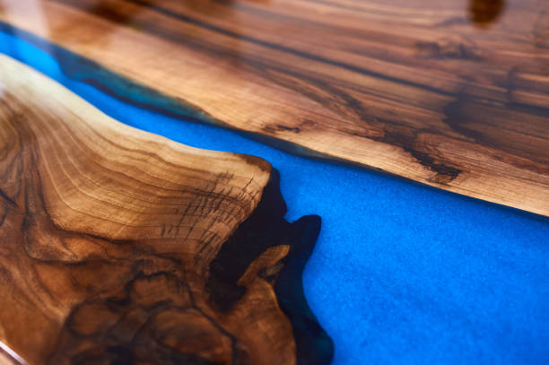 istock Texture of a wooden table with epoxy resin. 1401790010