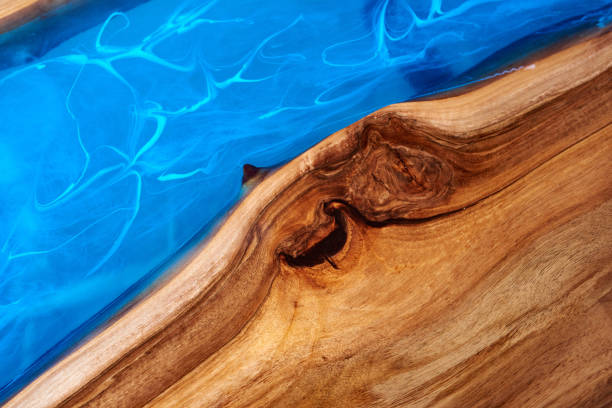 istock Texture of a wooden table with epoxy resin. 1401790056