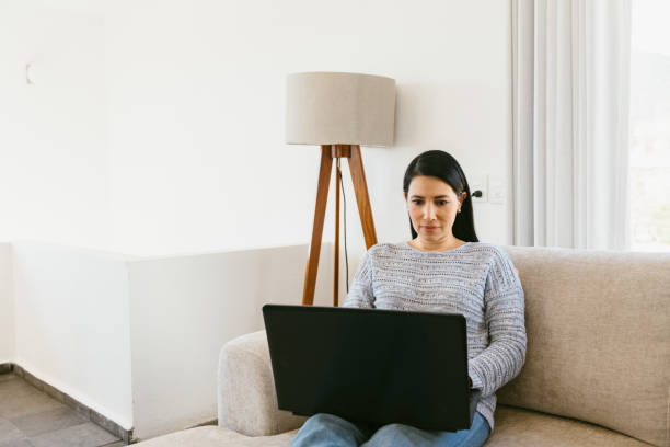 istock Woman working from Vacation rental 1401791363