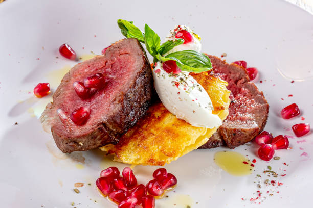 istock Marbled beef minion steak fried properly so that the middle is pink 1401792166