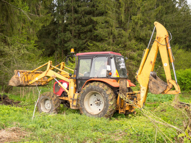 istock Construction machinery tractor with bucket and excavator 1401794900