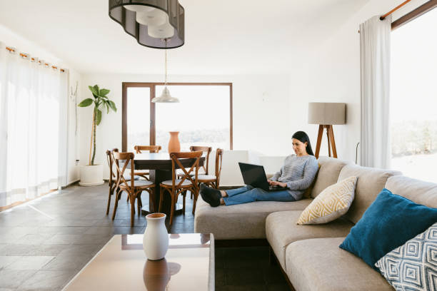 istock Woman working from Vacation rental 1401795374