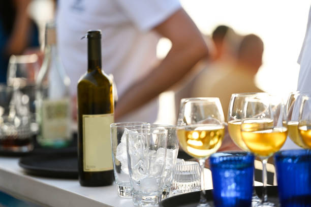 istock Half full glasses of white wine 1401796308