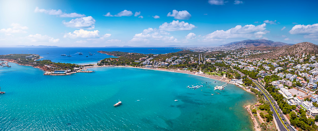 Aerial panorama of the beach at Vouliagmeni, south Riviera coast of Athens, Greece, with emerald, clear sea