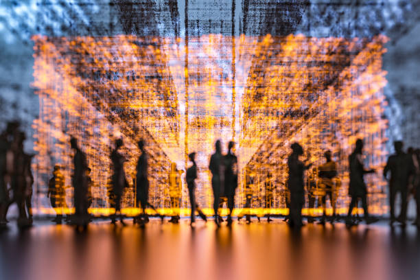 istock Unrecognizable people silhouettes in VR environment 1401797794