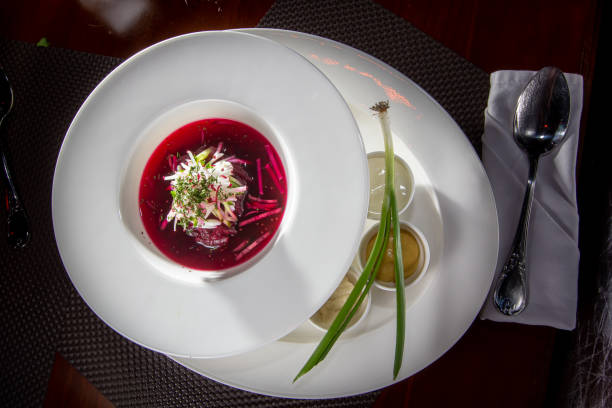 istock Cold borscht - speciality for hot days. Vegetable cold soup with beetroots. Shallow depth of field, selective focus 1401799299