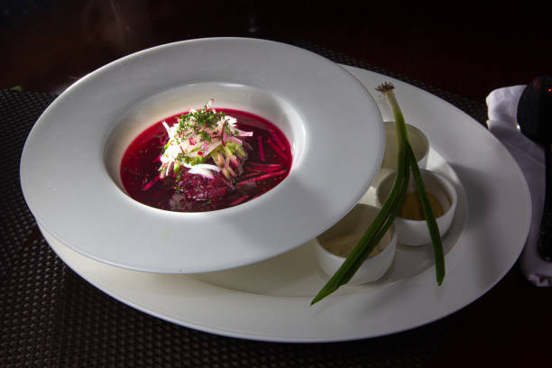 istock Cold borscht - speciality for hot days. Vegetable cold soup with beetroots. Shallow depth of field, selective focus 1401799492