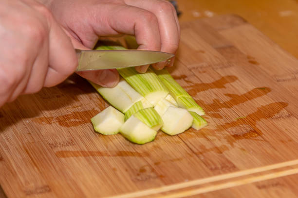 istock Zucchini cut on board, fresh raw vegetable food, green 1401800532