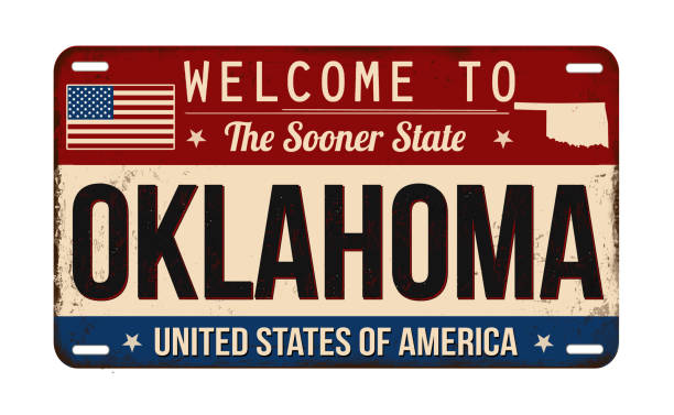 willkommen bei oklahoma vintage rostiges nummernschild - flag of oklahoma stock-grafiken, -clipart, -cartoons und -symbole