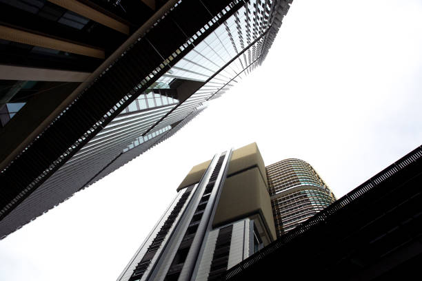 istock Low angle view of modern office buildings, skyscrapers, sky background with copy space 1401802836