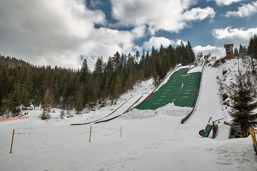 Ski jumping board on winter resort Vorokhta in Carpathian Mountains, Ukraine.