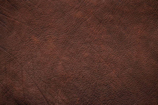 브라운 가죽 감촉 배경. 다크 스니더드 레더 - textured textured effect hide leather 뉴스 사진 이미지